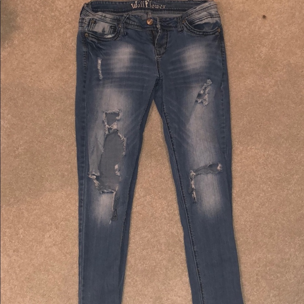 Low rise destroyed skinny jeans. Size 11.